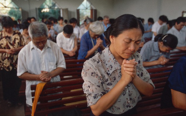 Prayer in an Asian church